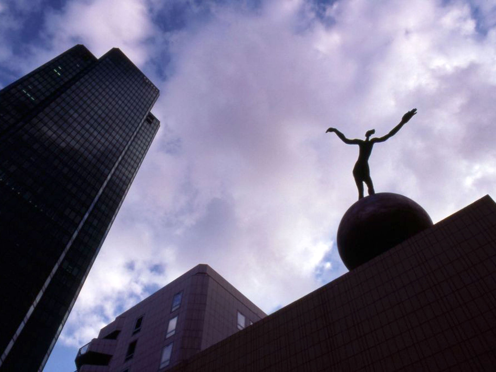 The Sleepwalker, a sculpture by Henri de Miller, installed in the Parisian district La Défense