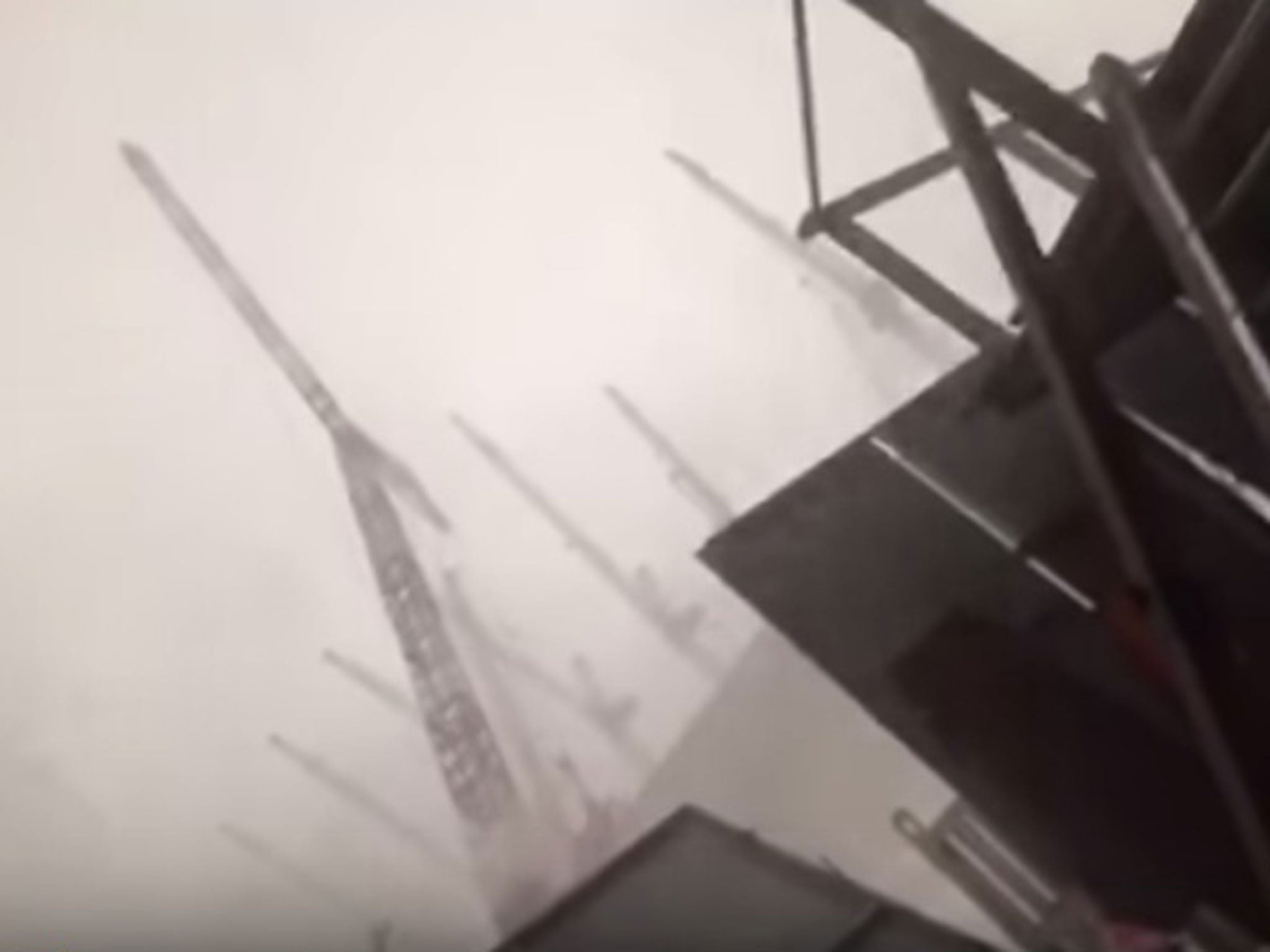 The footage shows the crane blowing over in the fierce gust (Youtube)