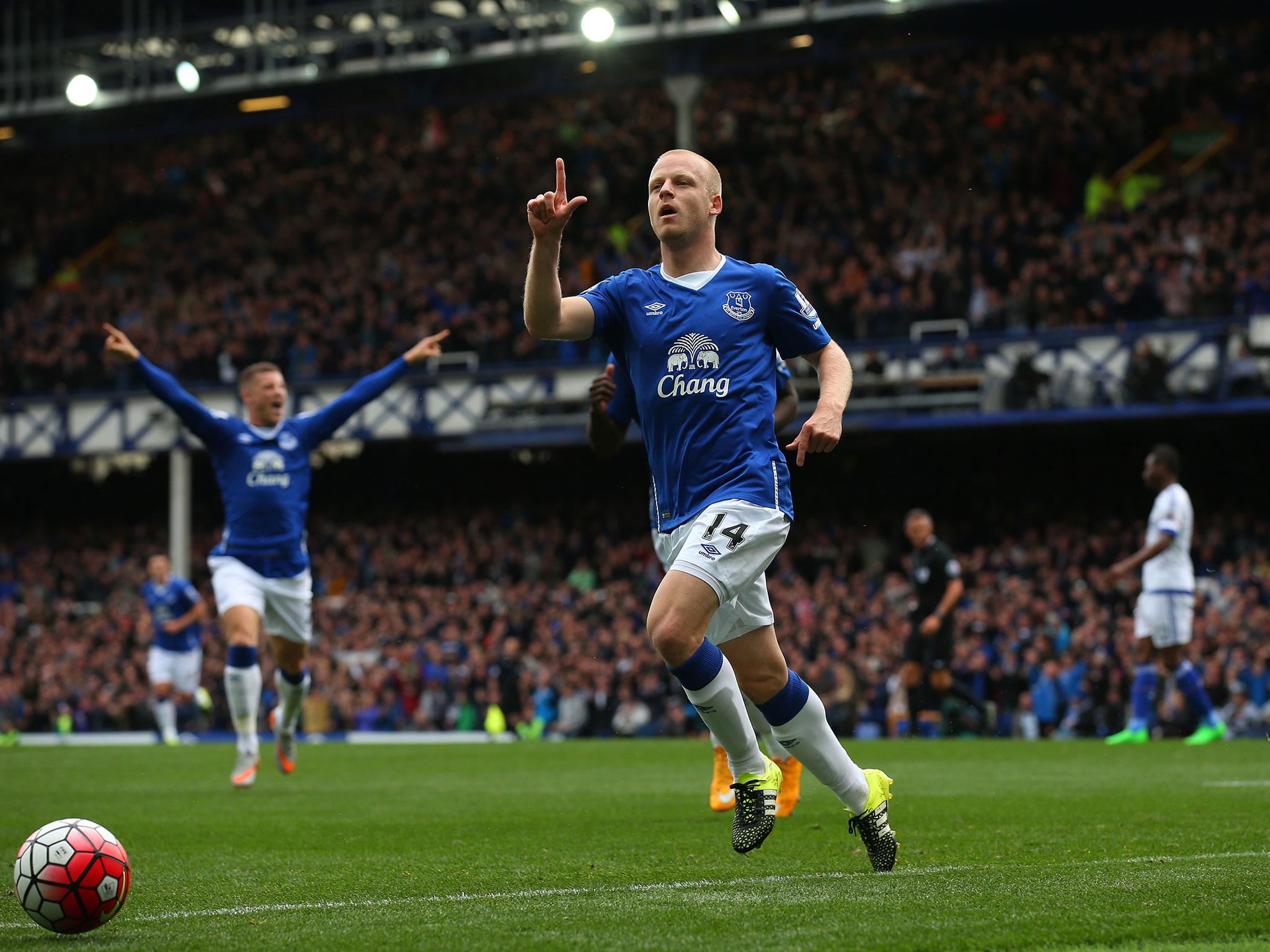 Steven Naismith celebrates scoring the opening goal for Everton