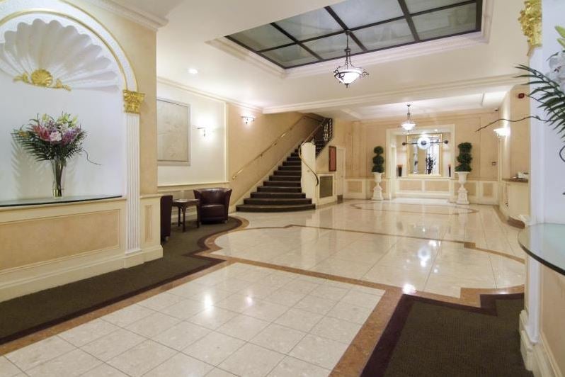 Marble-floored lobby of Princes Court