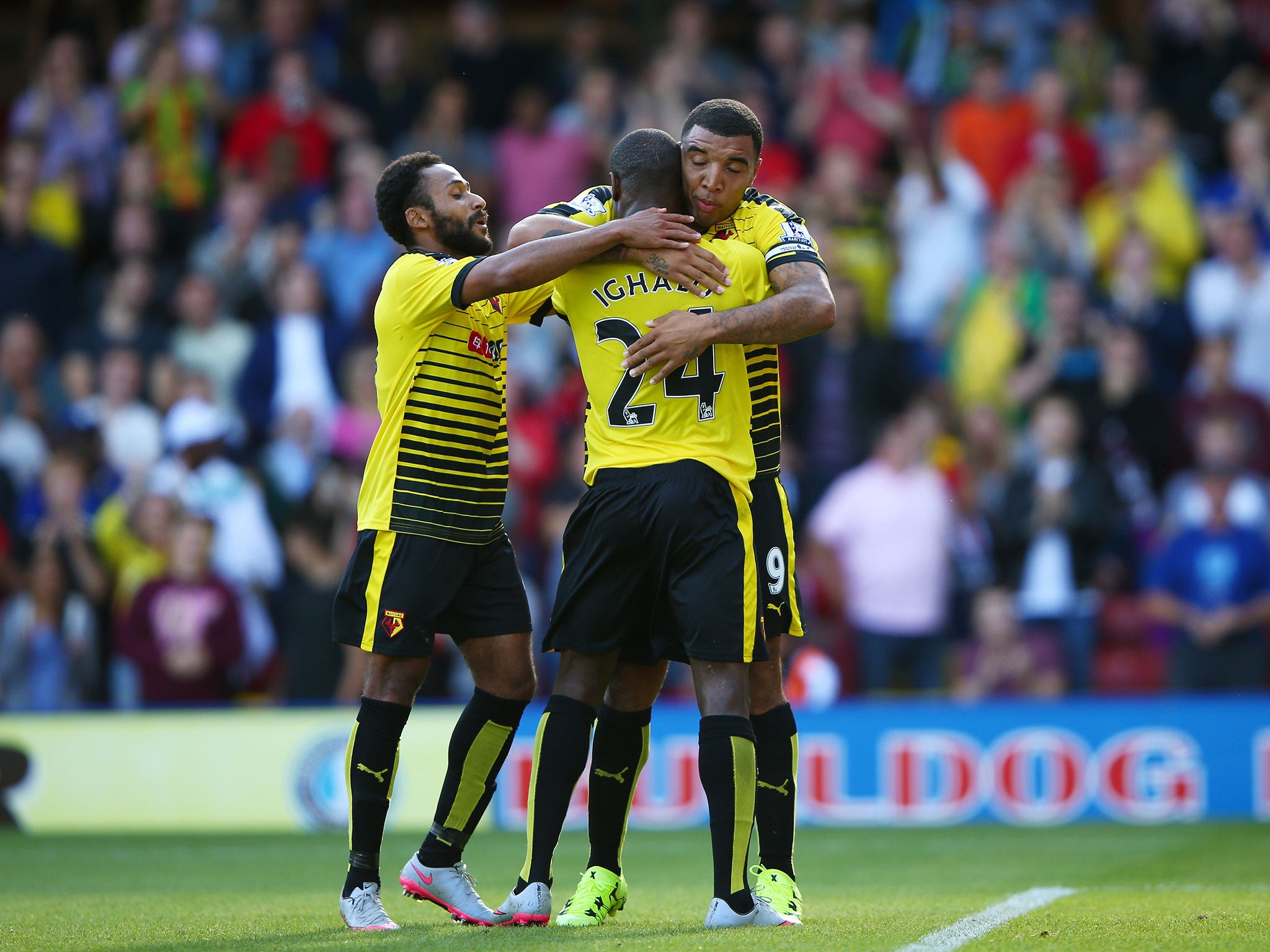 Troy Deeney celebrates with goalscorer Odion Ighalo