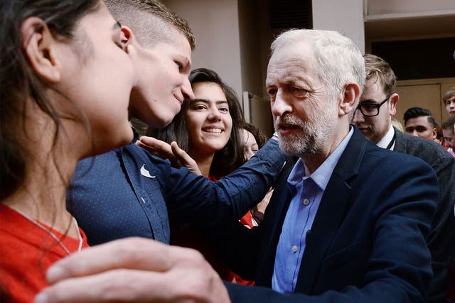 The new Labour leader is greeted by supporters