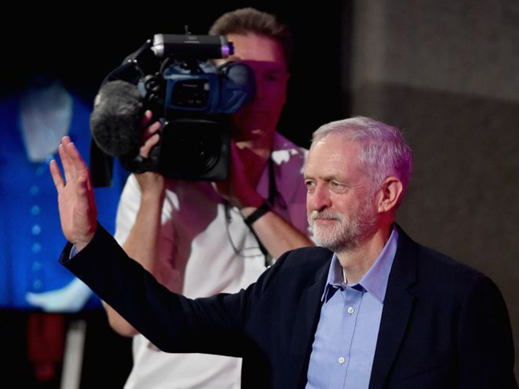 Jeremy Corbyn receives congratulations as his victory is announced