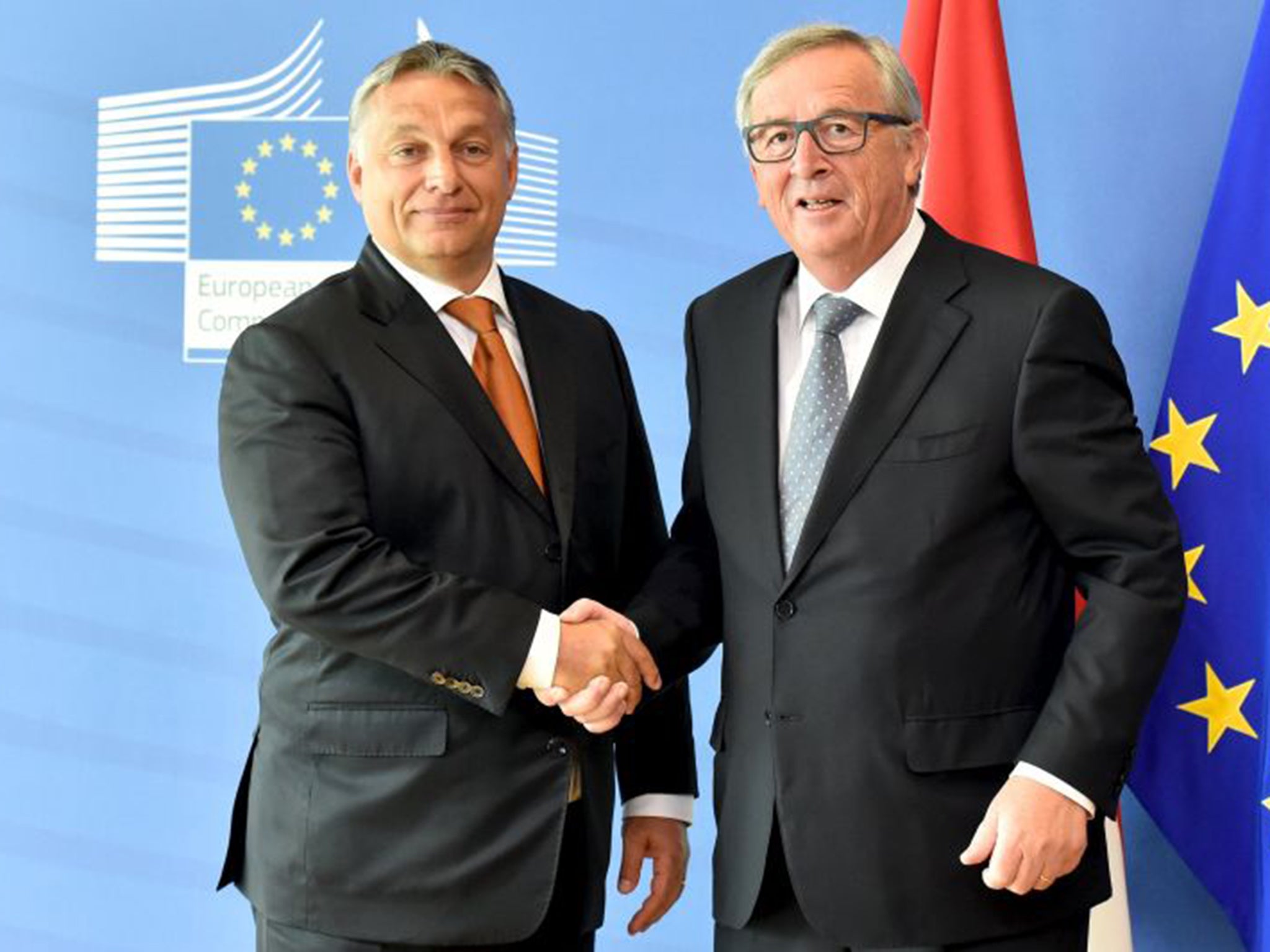 Hungary’s Prime Minister Viktor Orban, left; with Jean-Claude Juncker, has threatened to arrest refugees in his country illegally