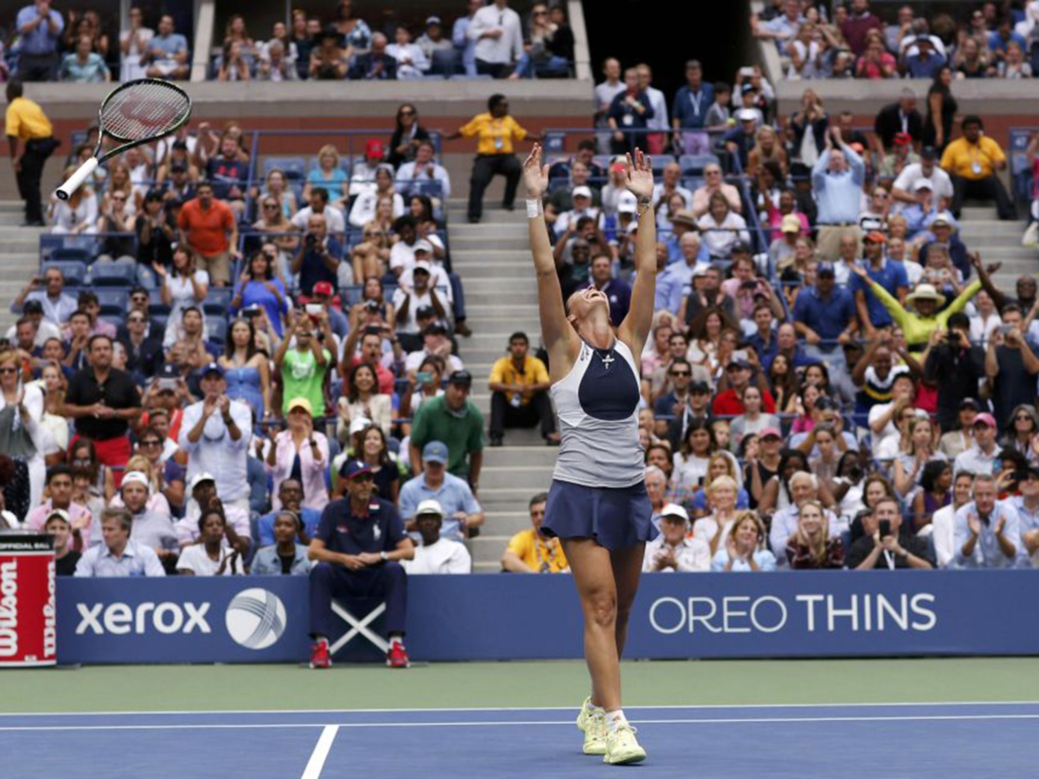 Flavia Pennetta celebrates after defeating her compatriot Roberta Vinci in the final of the women's singles at the U.S. Open