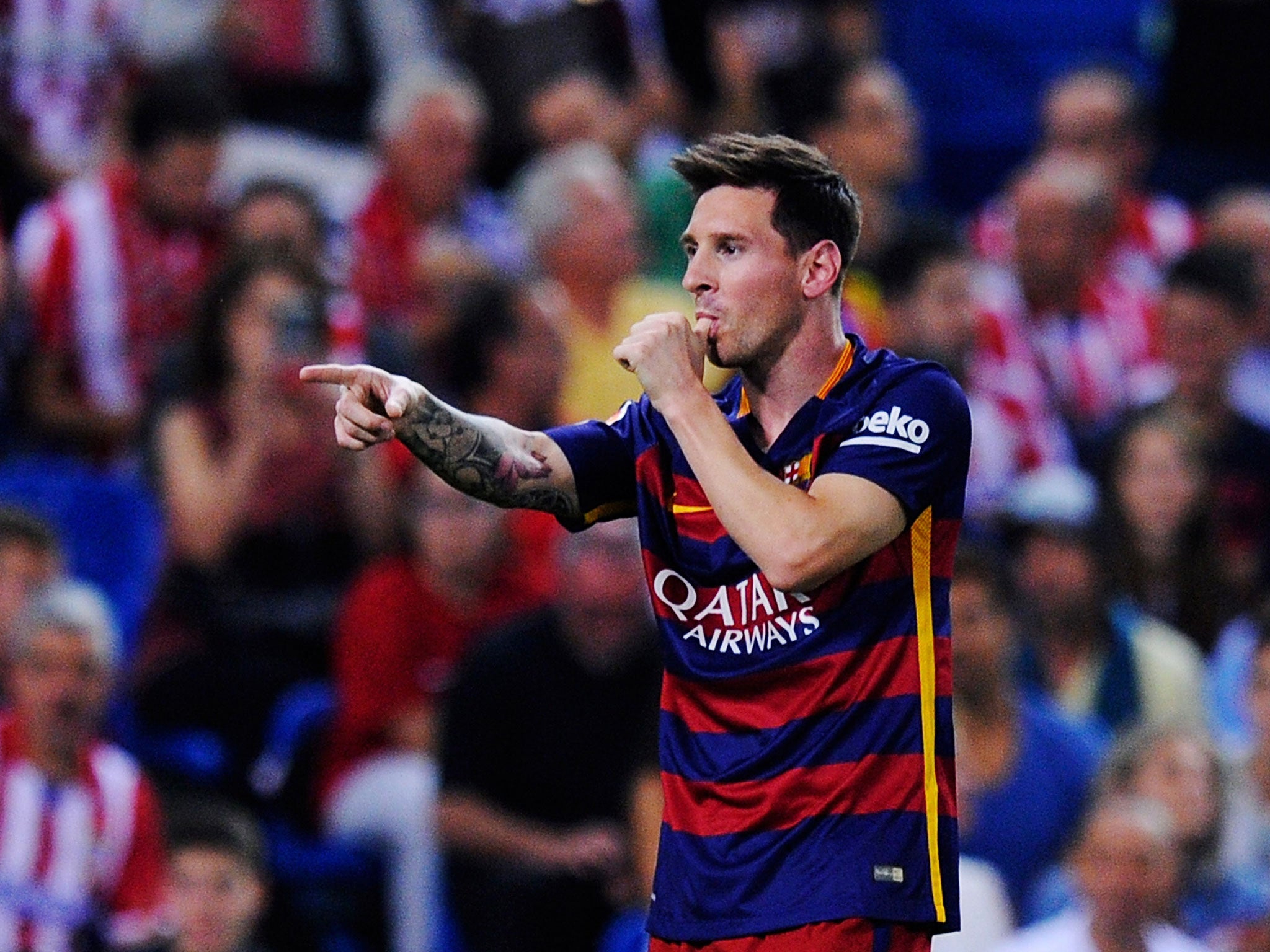 Lionel Messi celebrates scoring the winner in a 2-1 win for Barca over Atletico Madrid