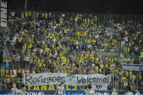 Maccabi Tel Aviv fans with the banner before the game against Kiryat Shmon