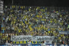 Maccabi Tel Aviv fans wave 'refugees not welcome' banner