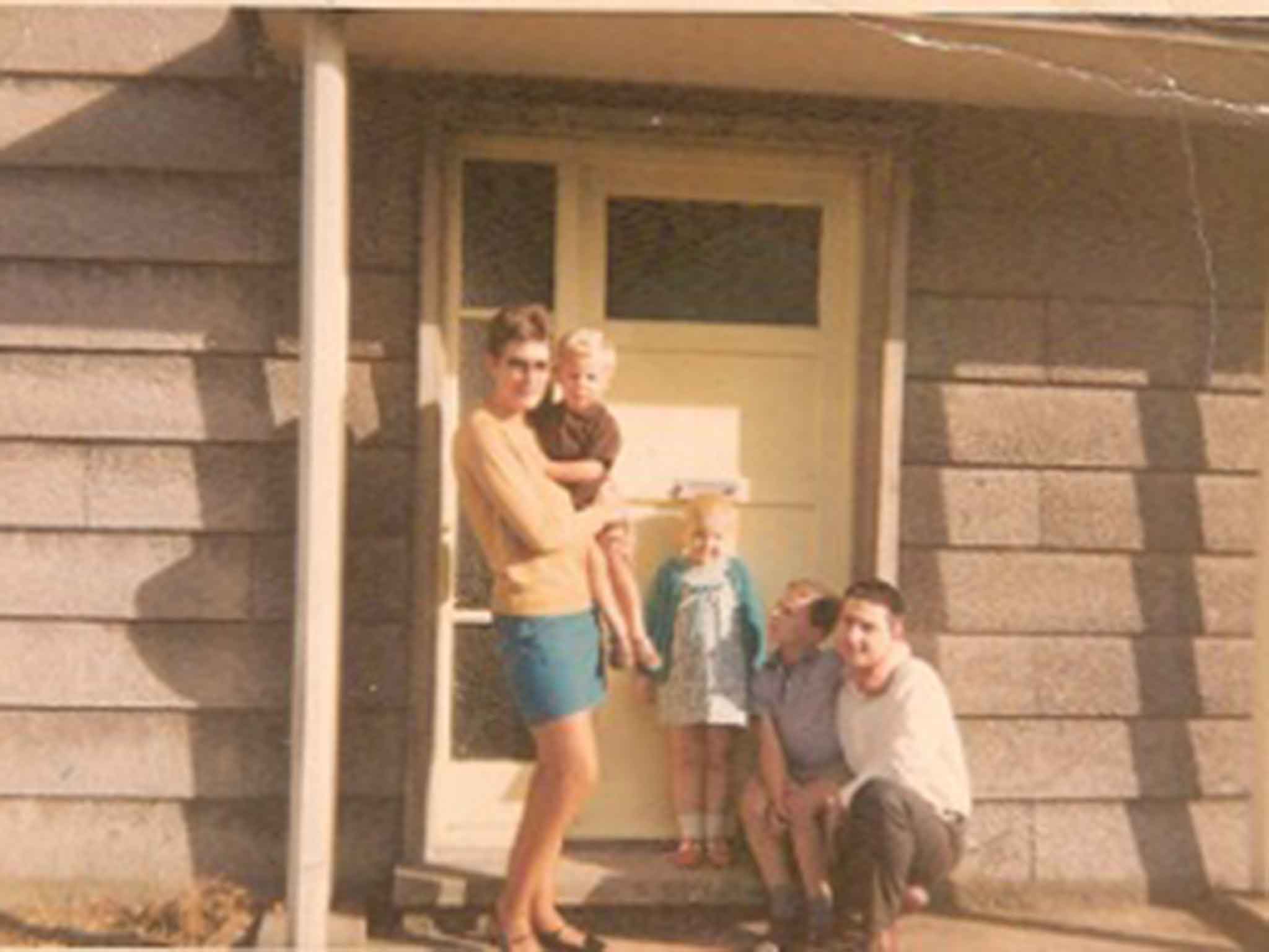 Nigel Cooper in his mother’s arms as a child