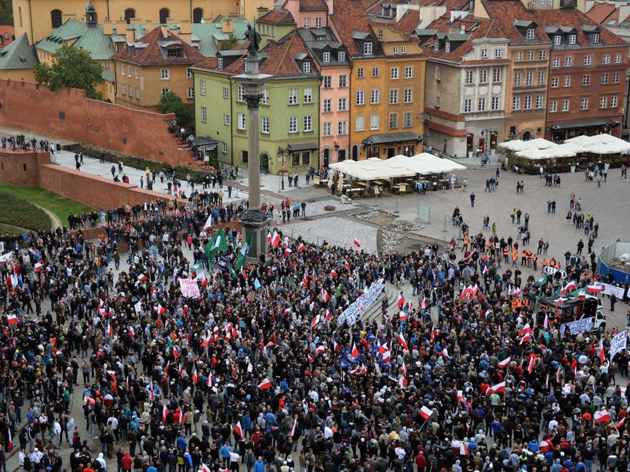 Right-wing demonstrators gather on a square in the old town of in Warsaw (Image: AFP)