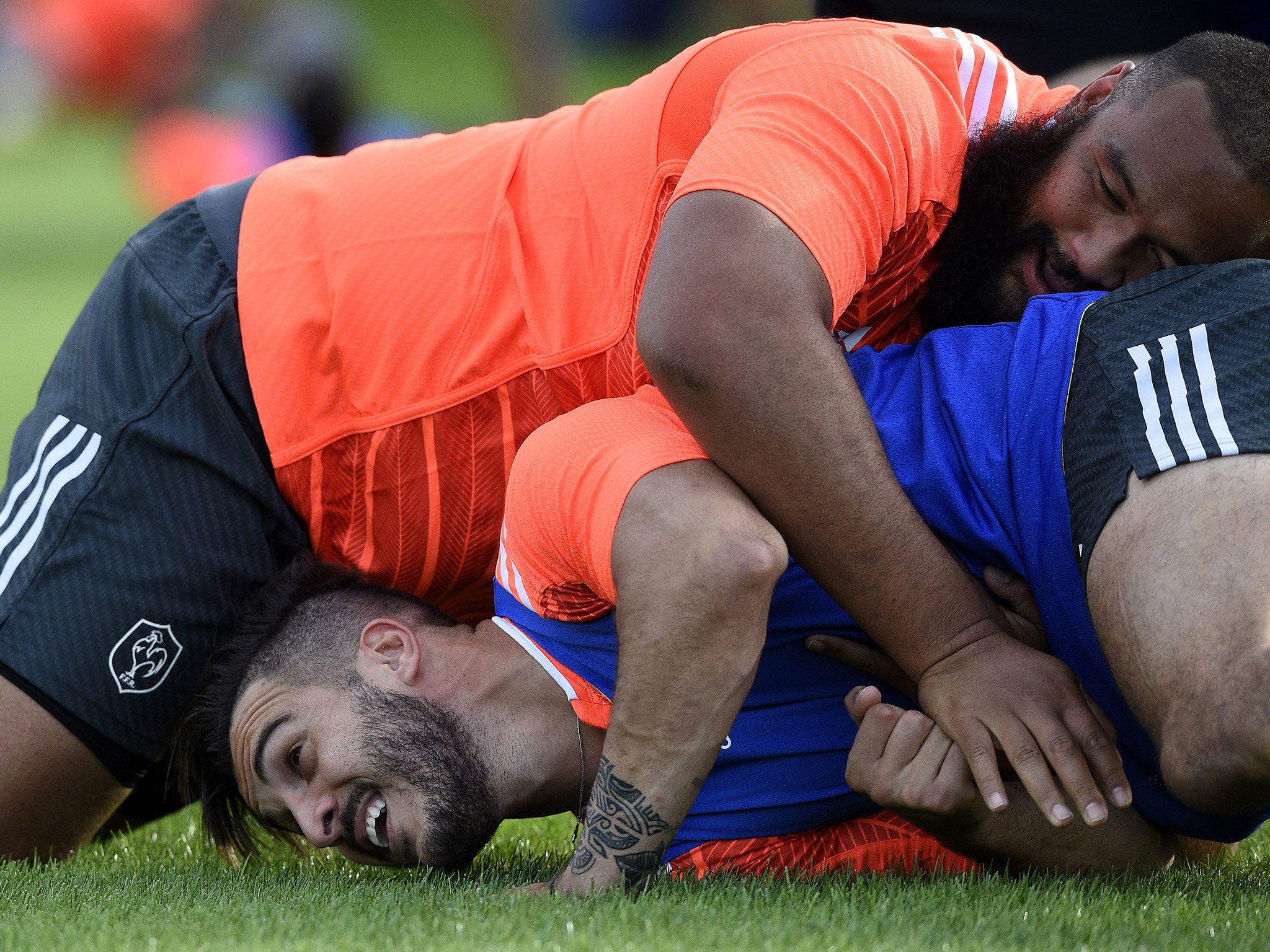 Uini Atonio tackles his France team-mate Sofiane Guitoune in training