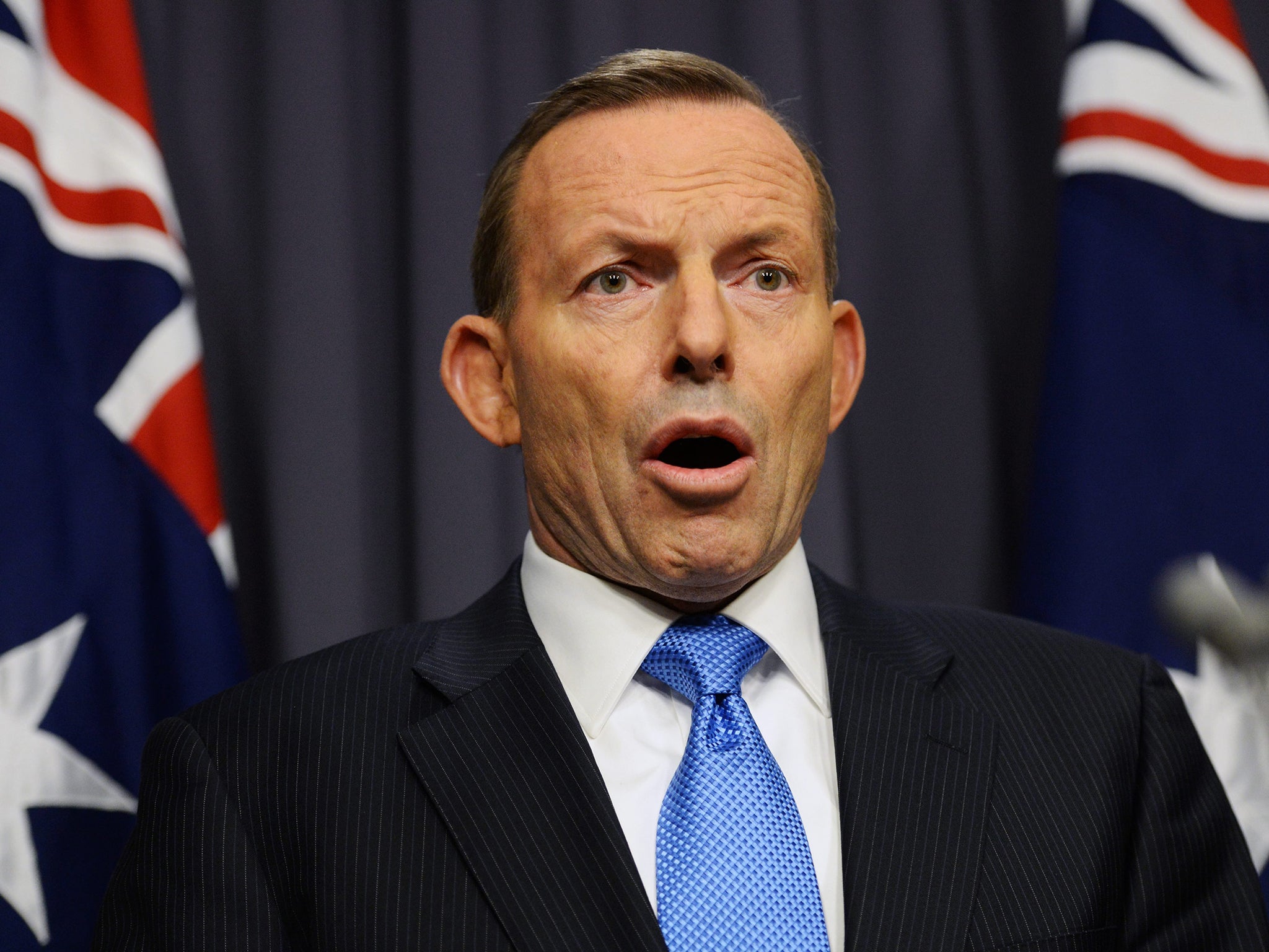 Australian Prime Minister Tony Abbott speaks during a press conference in the Blue Room, at Parliament House in Canberra, Australia