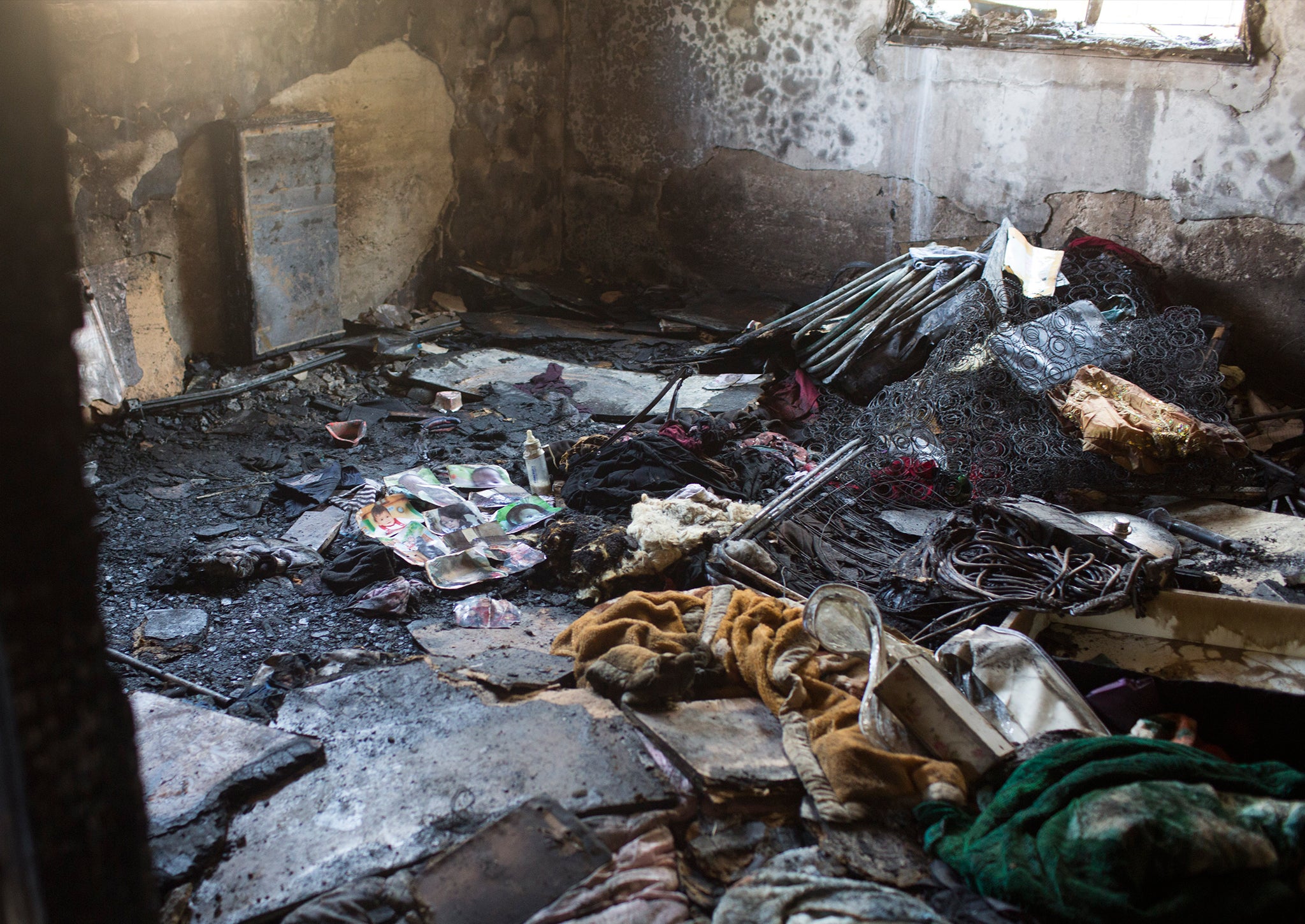 The remains of the Dawabsheh house after a fire. It was suspected to have been set by Jewish extremists on July 31, 2015 in the Palestinian village of Duma, West Bank