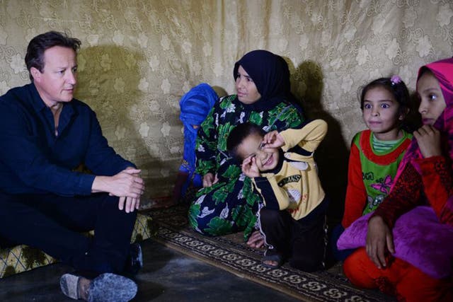 David Cameron visited Syrian refugee families at a camp in the Bekaa Valley on Monday