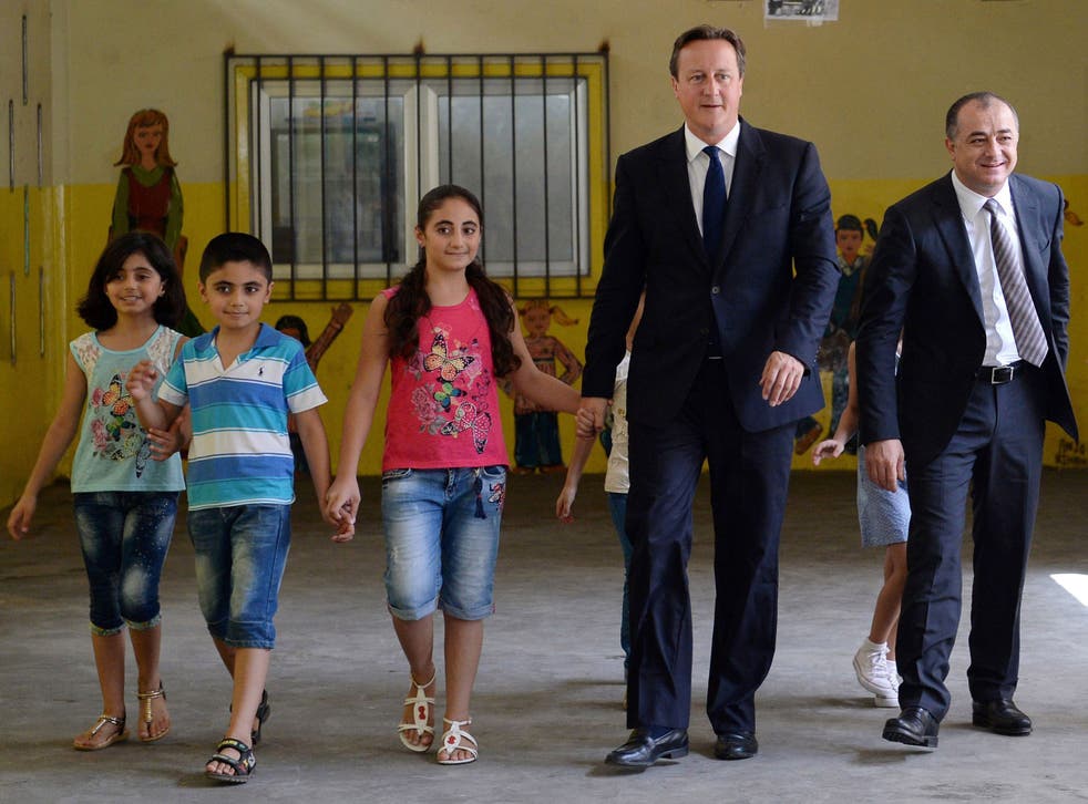 Prime Minister David Cameron visits the Lebanon school with Lebanese Education minister, Mr Elias Bou Saab