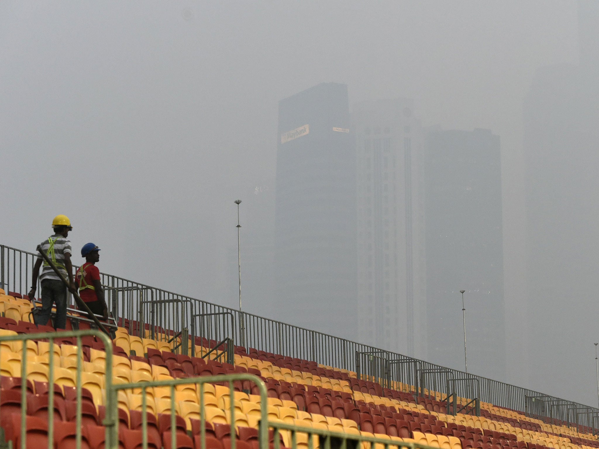The fans' seating area is surrounded by thick smog