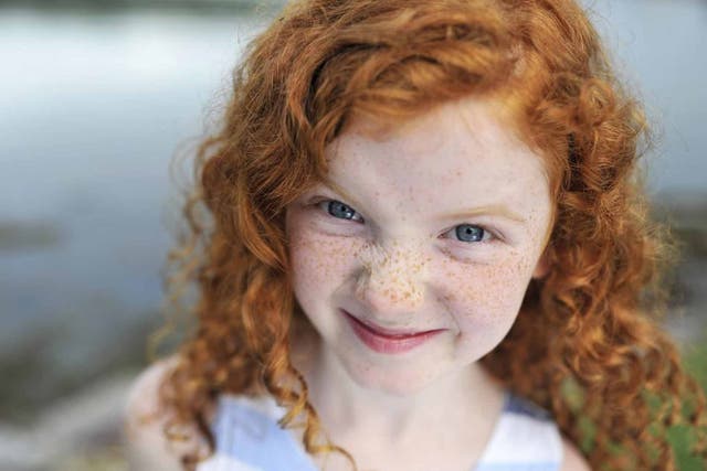 Rhea Reidy, aged 7, at the Irish Redhead Convention, which celebrates red hair each year in the village of Crosshaven