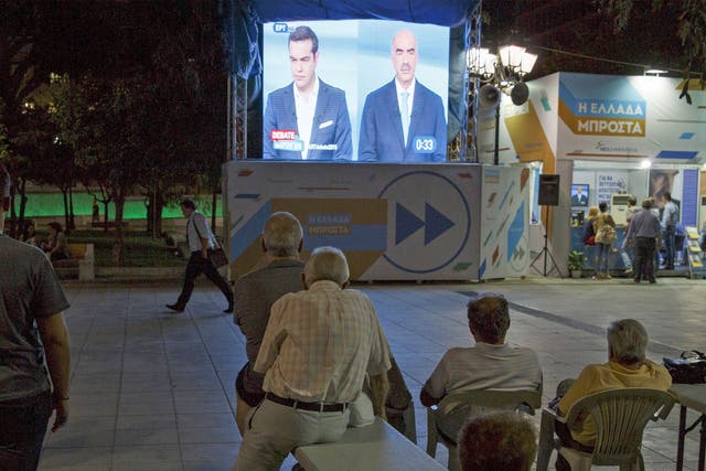 People watch the debate in Syntagma Square, Athens