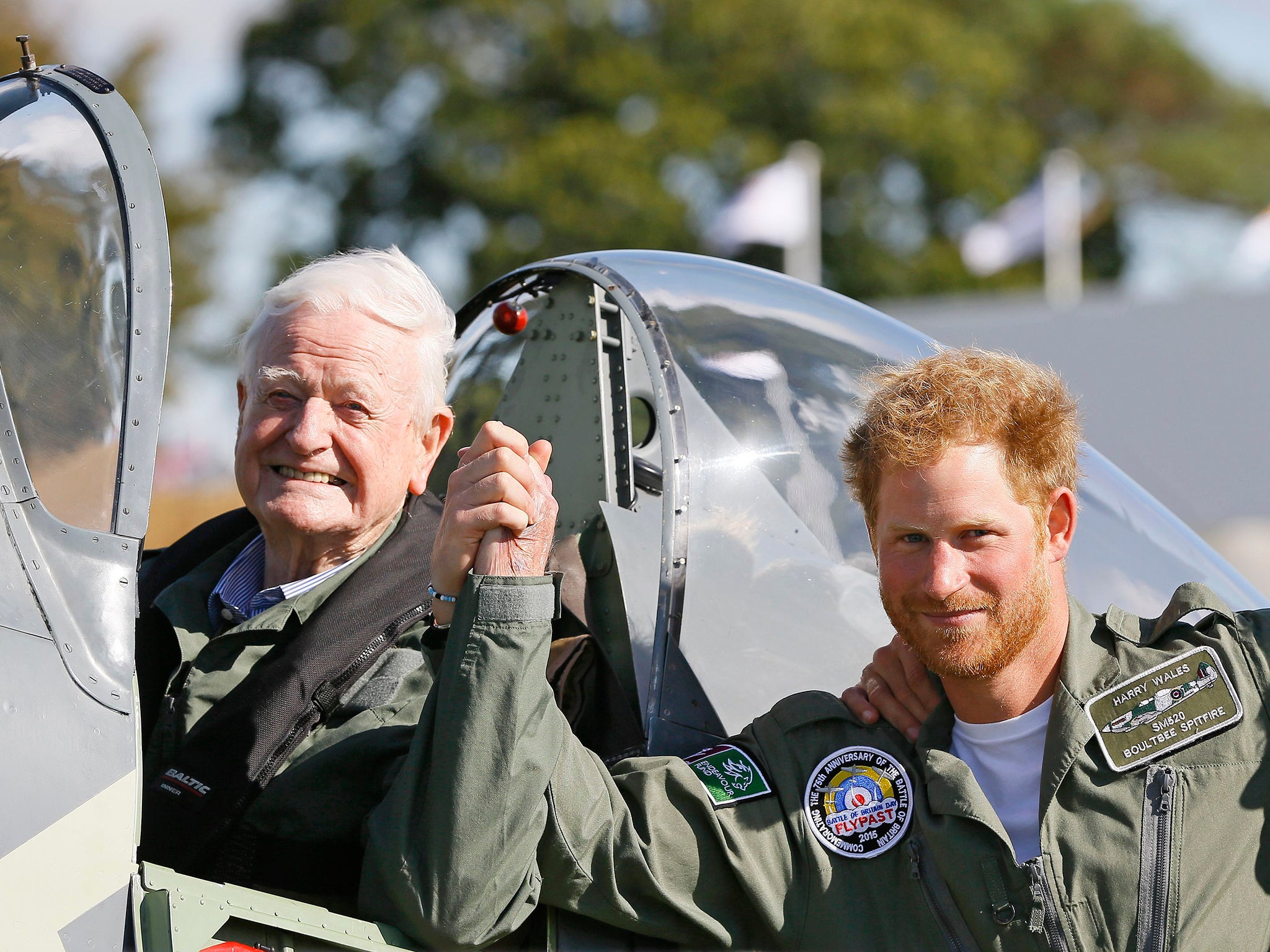 Prince Harry with Tom Neil after the 95-year-old ex-wing commander and Battle of Britain Hurricane and Spitfire pilot took part in the Battle of Britain Flypast to mark the 75th anniversary of victory in the Battle of Britain at Goodwood Aerodrome in West