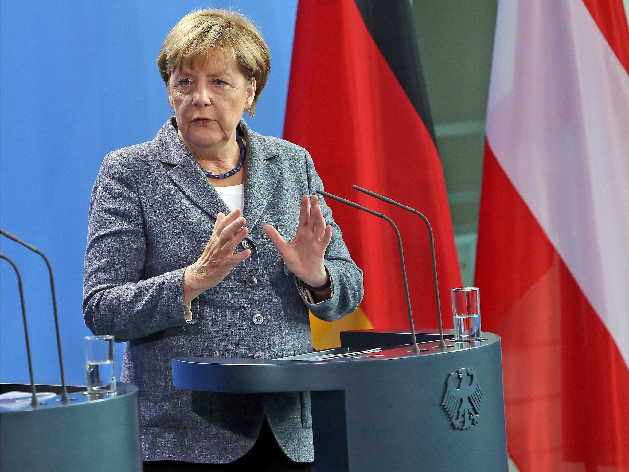 German Chancellor Angela Merkel speaks to the media after talks on the ongoing refugee crisis, in Berlin (Getty)