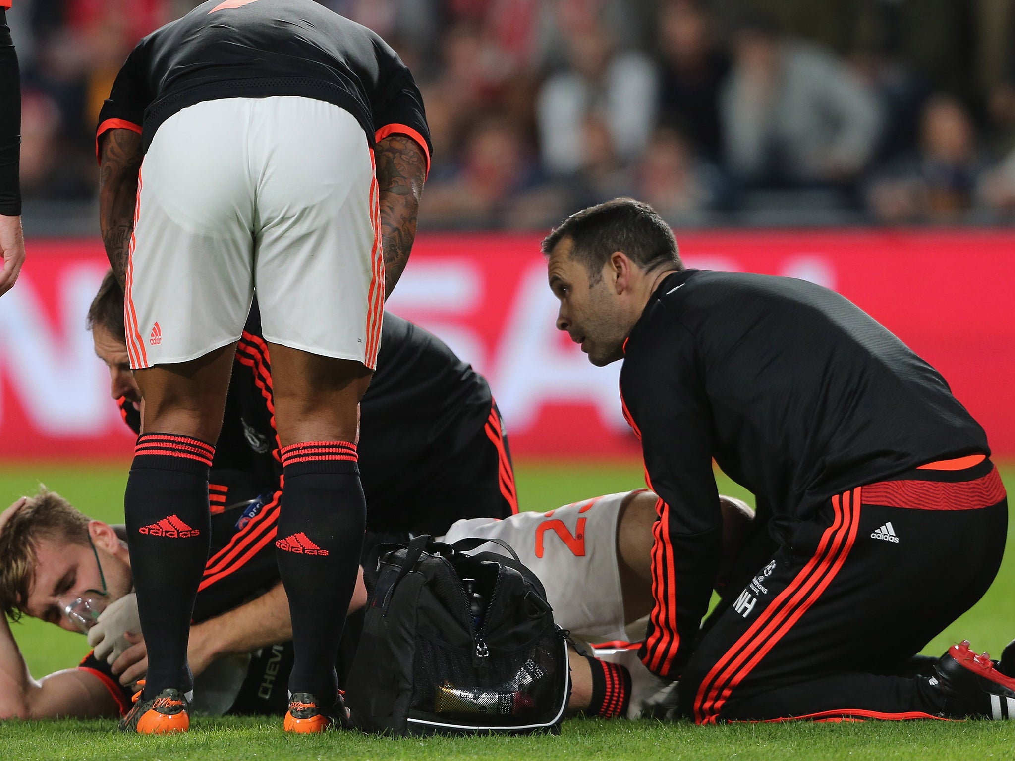 Luke Shaw is treated by United medics after suffering a double leg fracture