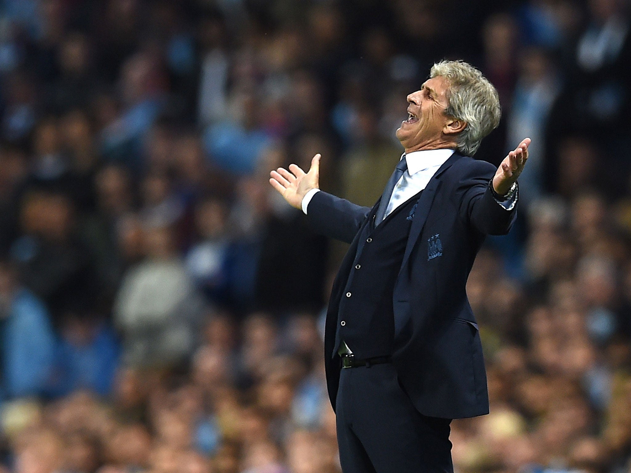 Manchester City manager Manuel Pellgrini reacts to Juventus' second goal