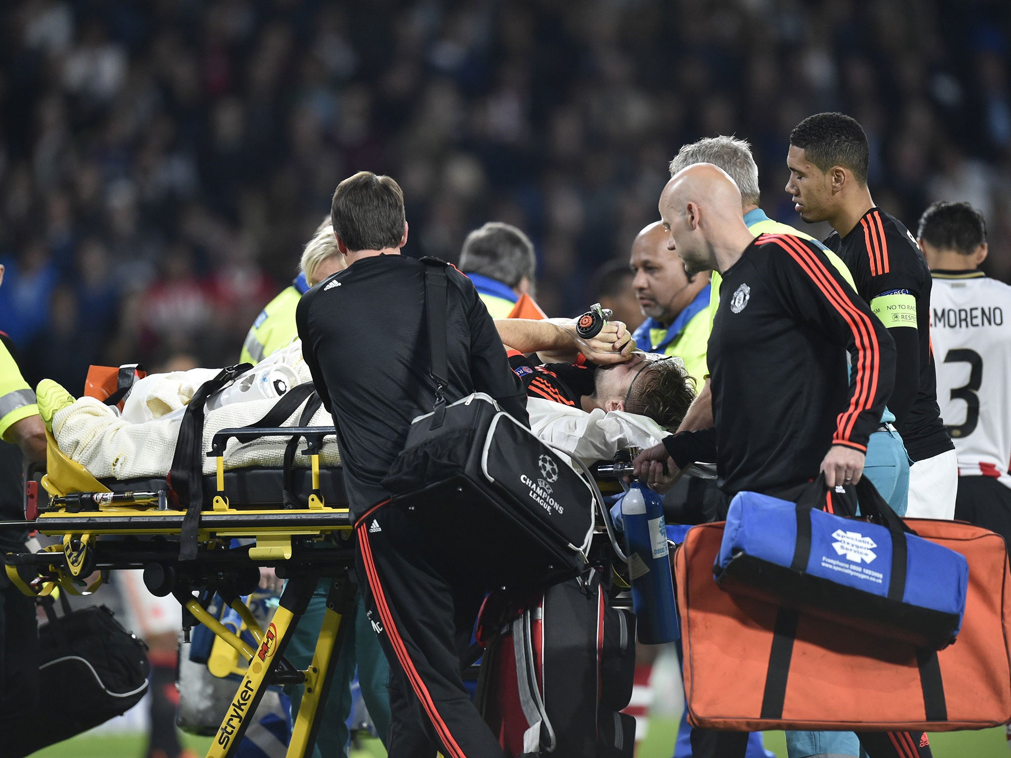 Shaw is carried off the pitch