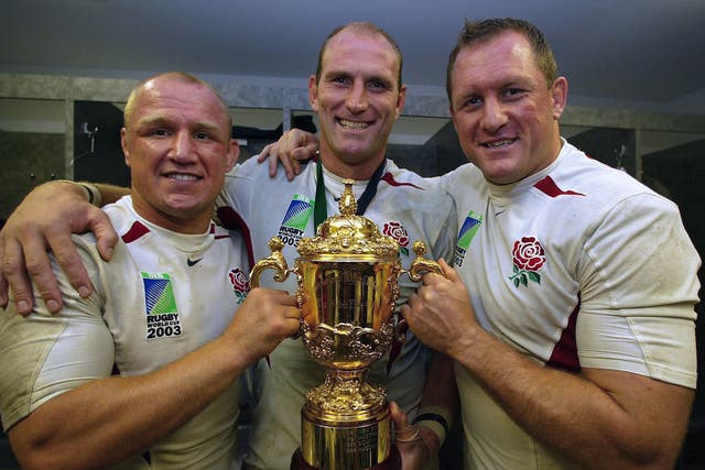 Neil Back, Dallaglio and Richard Hill with the William Webb Ellis trophy after the 2003 Rugby World Cup success