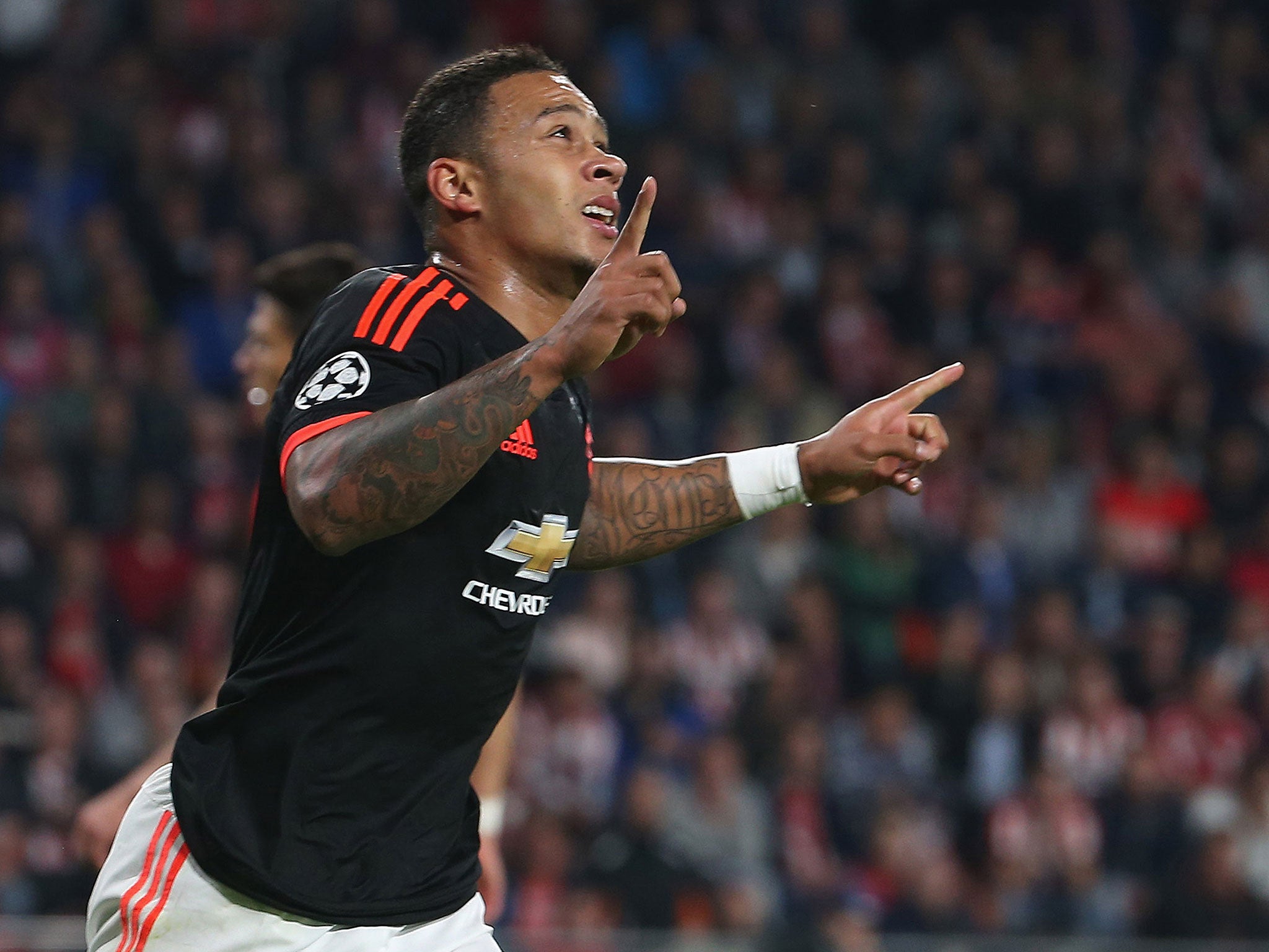 Memphis Depay celebrates a goal for Manchester United