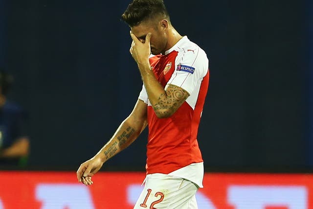 Olivier Giroud leaves the field after his dismissal