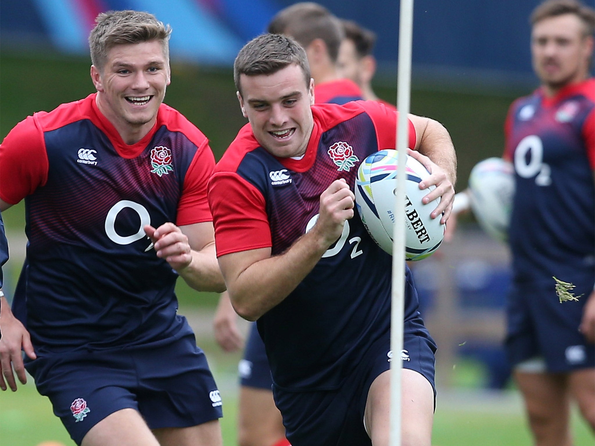 George Ford, with the ball, and Owen Farrell enjoy training at Bagshot