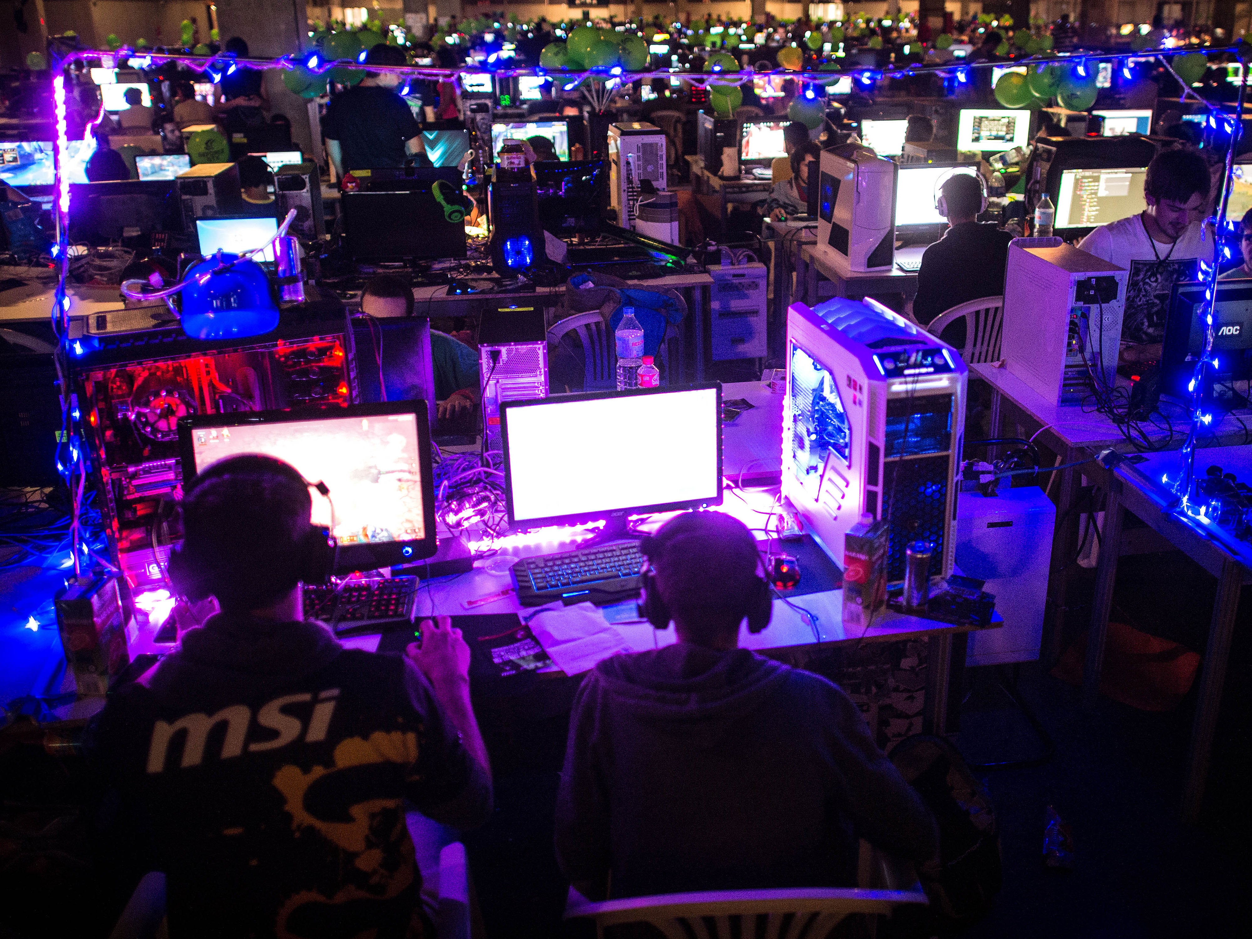 Participants play on their computers during the DreamHack Valencia 2014 on July 18, 2014 in Valencia, Spain
