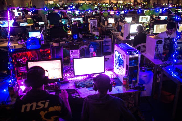 Participants play on their computers during the DreamHack Valencia 2014 on July 18, 2014 in Valencia, Spain