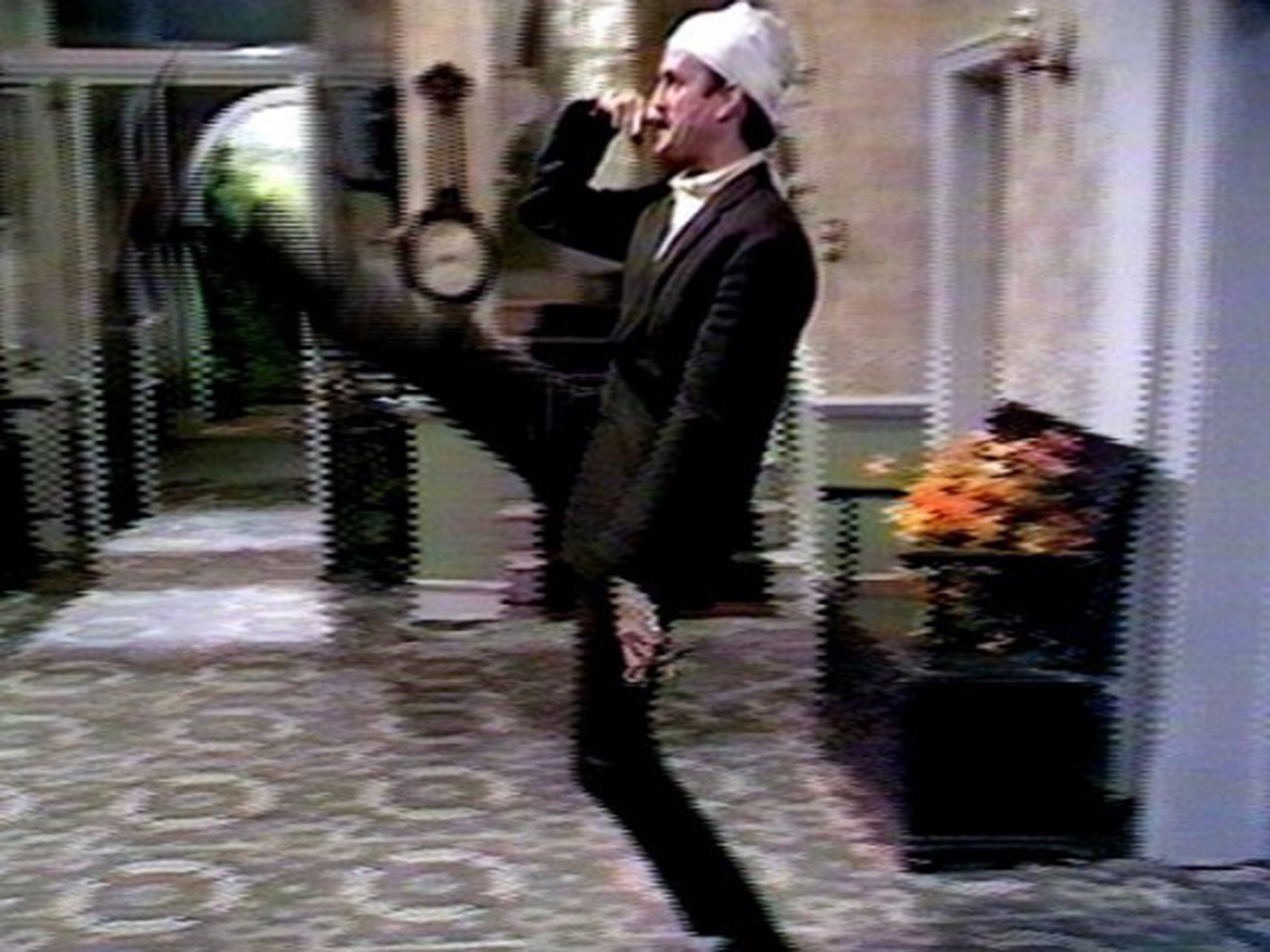 The drugged and bandaged Basil goose-stepping around the hotel in ‘The Germans’