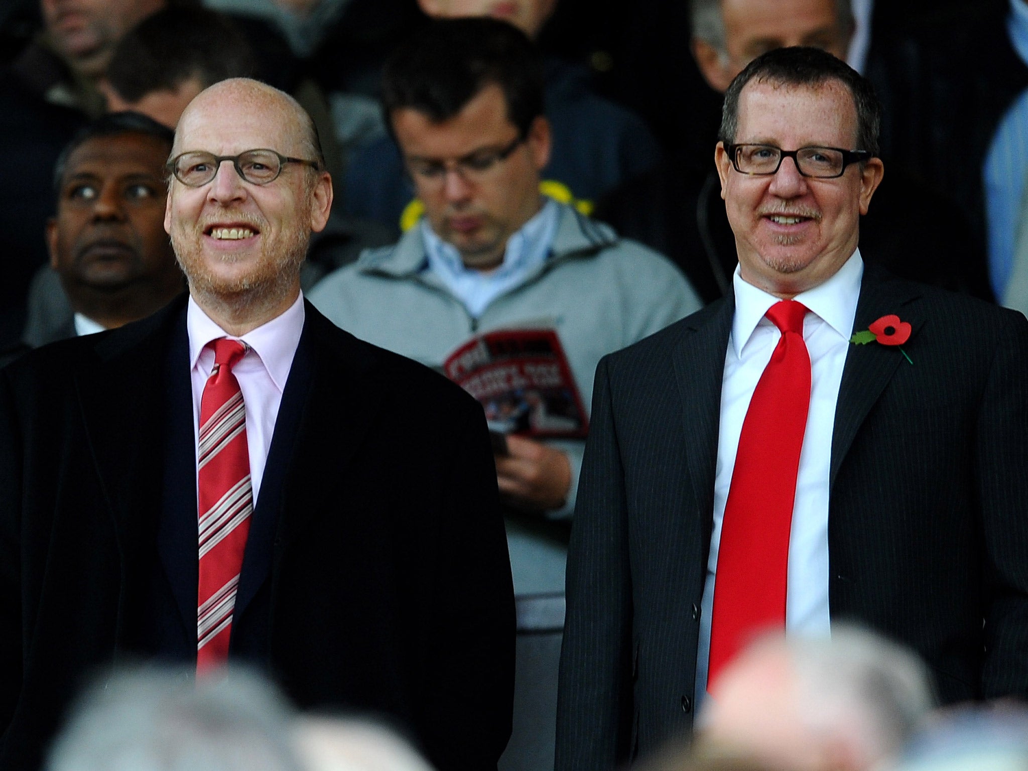 Two of the Glazer brothers, Avram and Bryan, at a Manchester United game (PA)