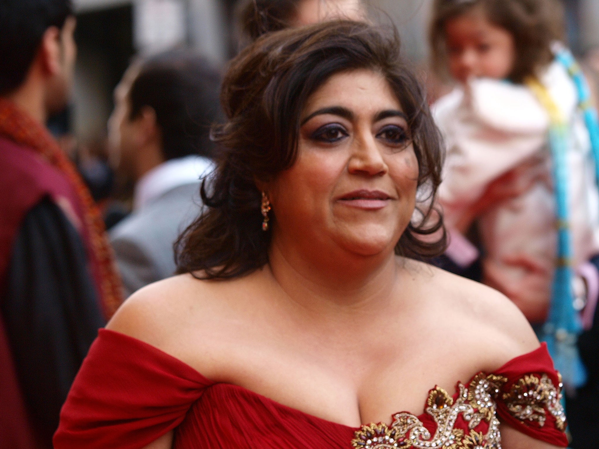 Gurinder Chadha poses on arrival for the British Premiere of the film, 'It's A Wonderful Afterlife' at London's Leicester Square