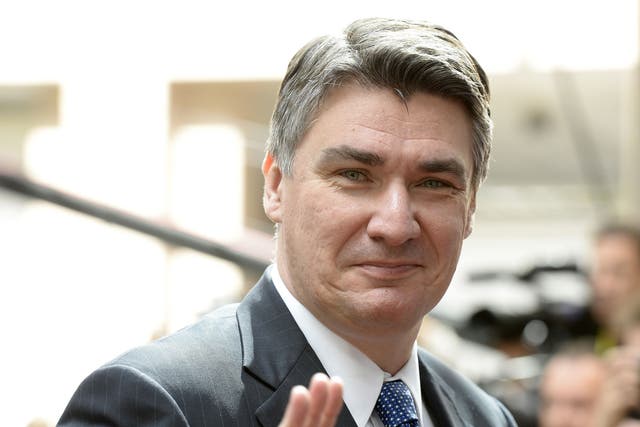 Prime Minister Zoran Milanovic arrives for day two of an EU summit 