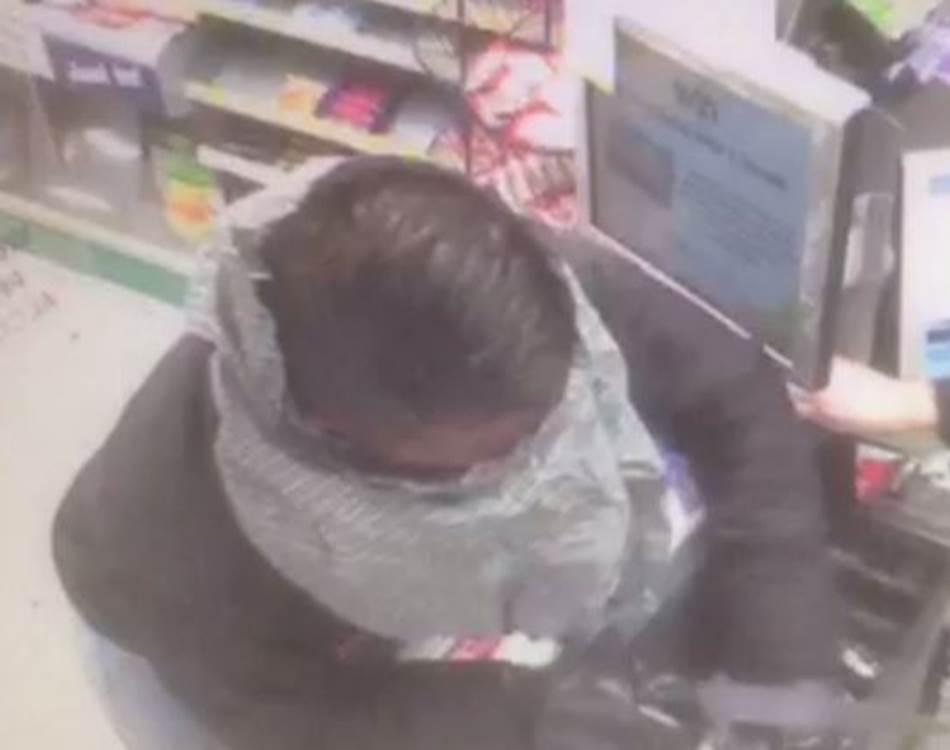 The unidentified man robbed the corner shop at knifepoint, taking cash with him as he left