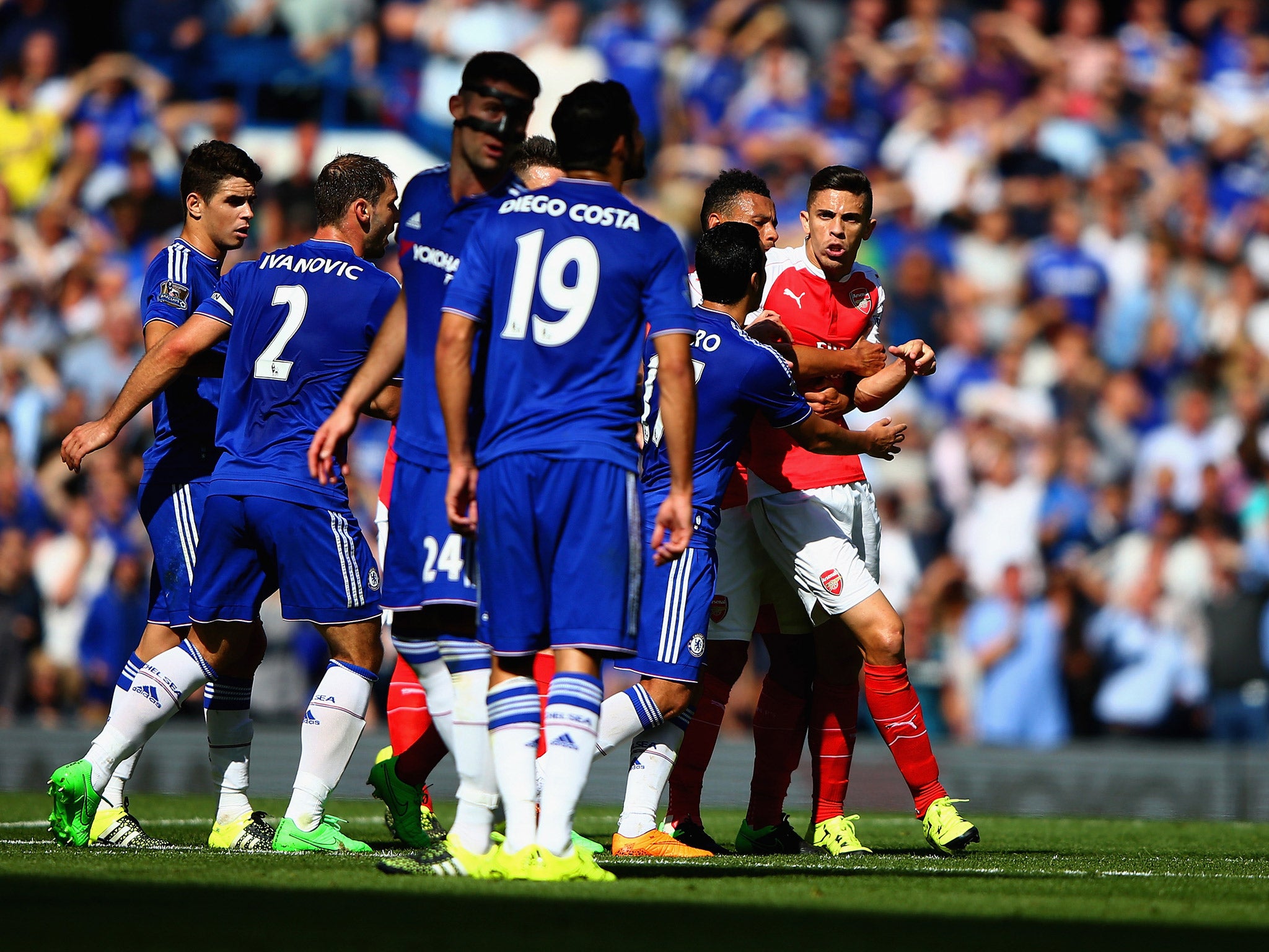 Diego Costa and Gabriel square up during Chelsea's clash with Arsenal
