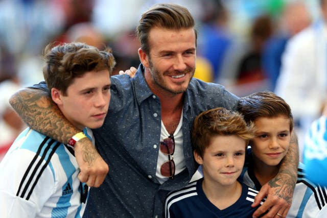 David Beckham and sons Brooklyn, Cruz and Romeo prior to the 2014 FIFA World Cup Brazil Final match between Germany and Argentina in 2014