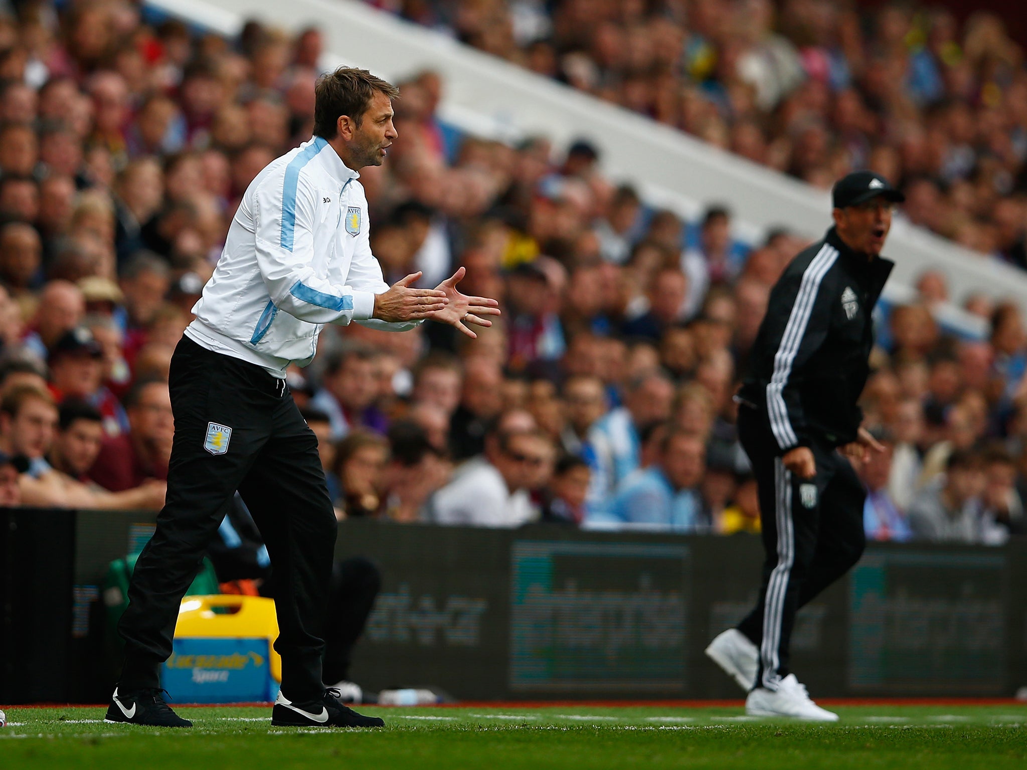 Tim Sherwood and Tony Pulis watch the action