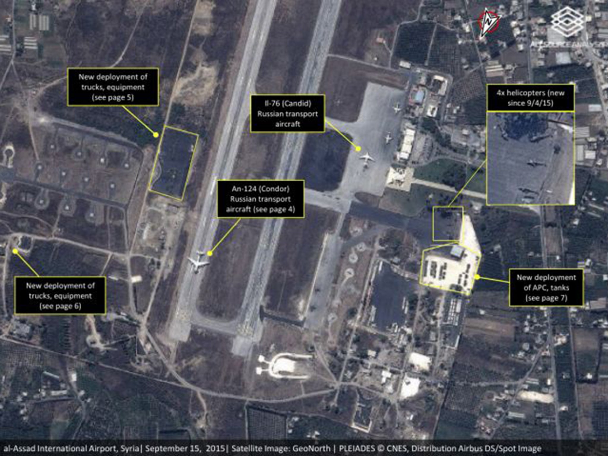 This September 2015 satellite image shows Russian transport aircraft, helicopters, tanks, trucks and armed personnel carriers at an air base in Latakia province, Syria