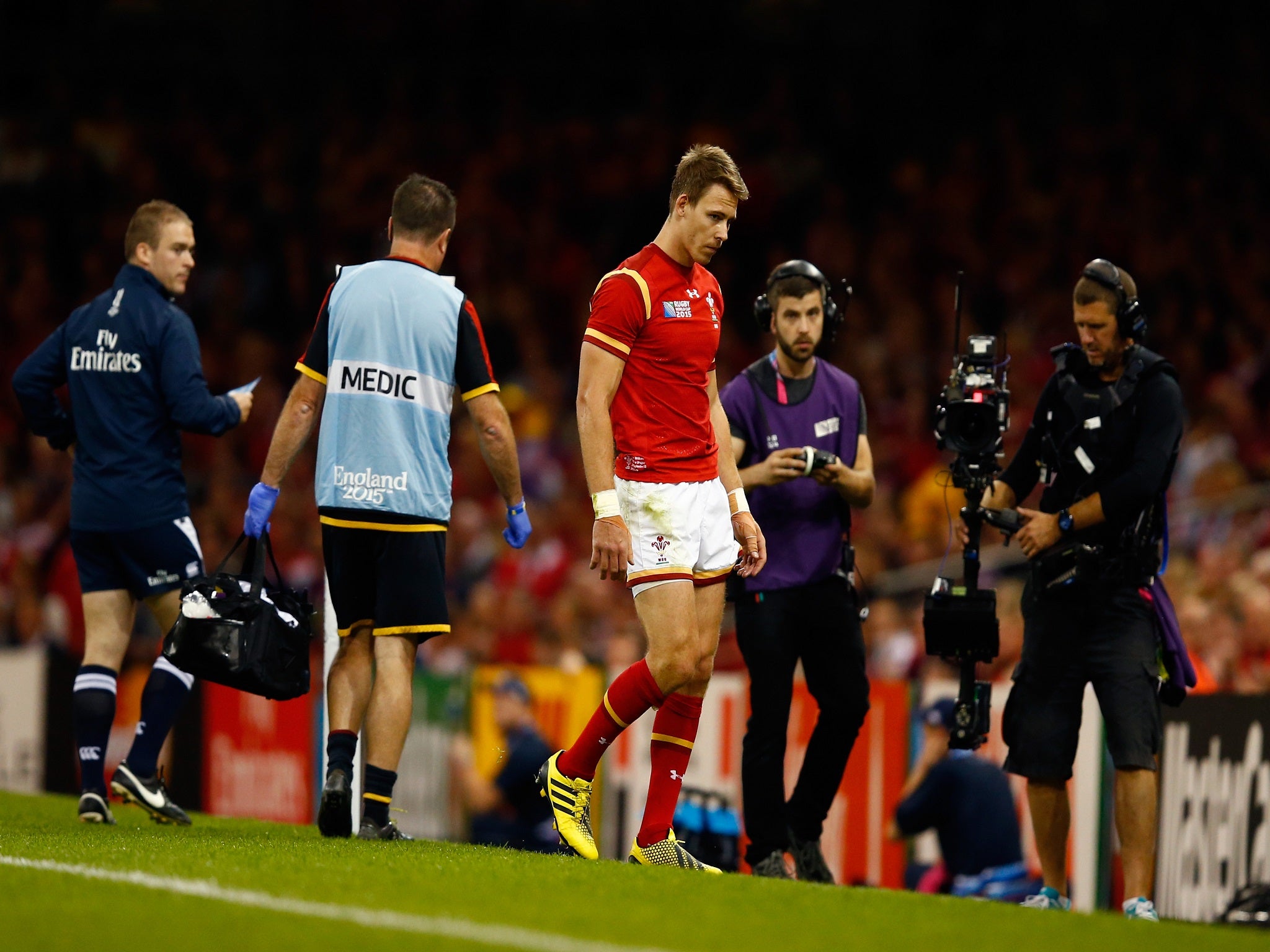 Liam Williams limps off the field during Wales' win over Uruguay