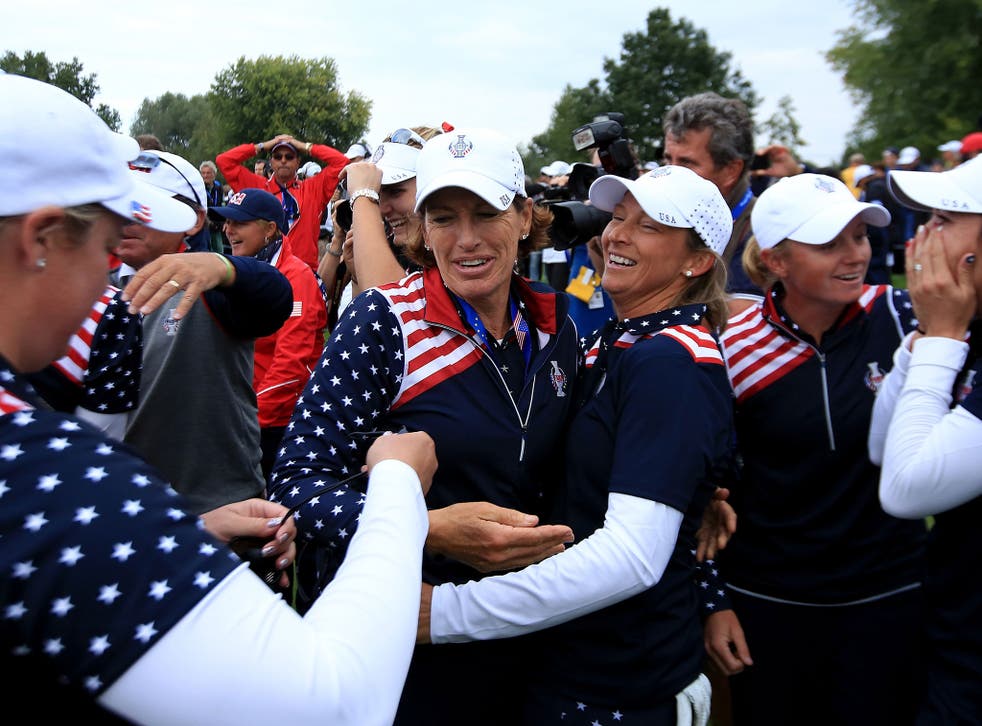 The United States celebrate victory in the Solheim Cup