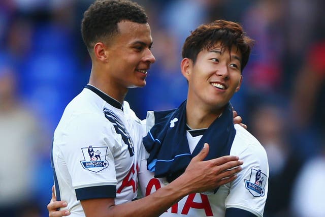 Heung-Min Son (right) celebrates Tottenham's win with Dele Alli