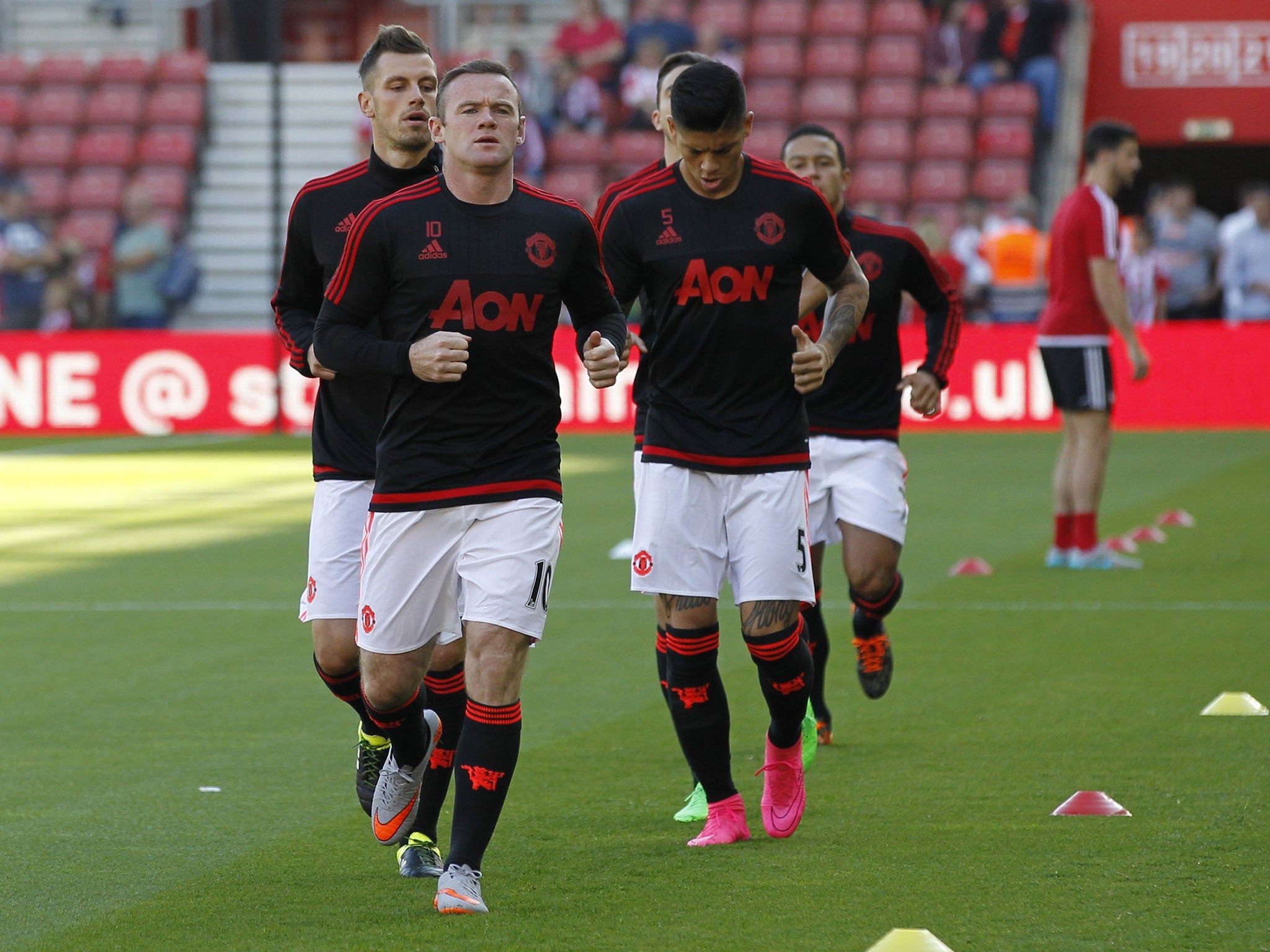 Wayne Rooney warms up ahead of the English Premier League football match between Southampton and Manchester United at St Mary's Stadium in Southampton