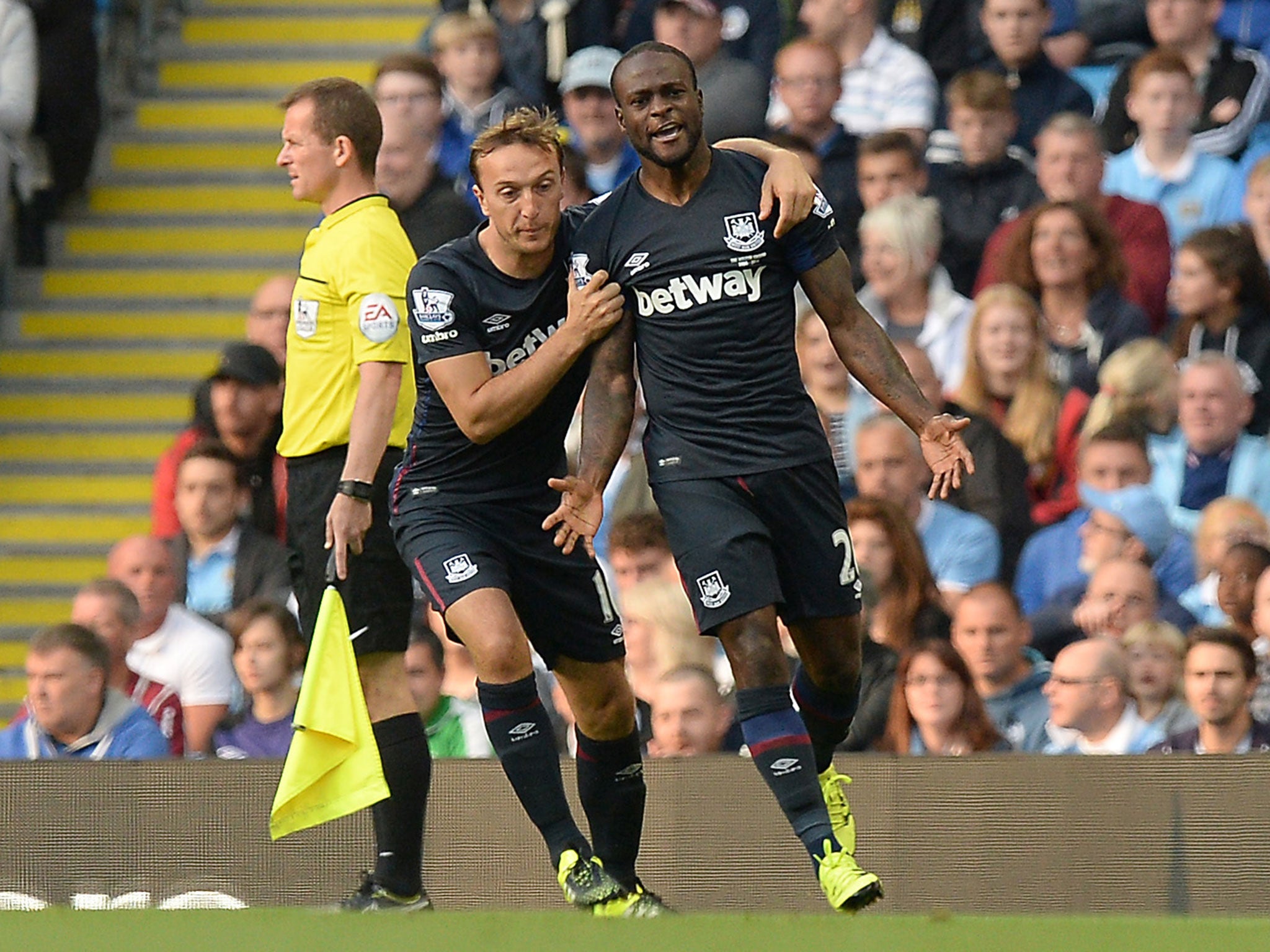 Victor Moses, right, celebrates scoring the opener with West Ham team-mate Mark Noble