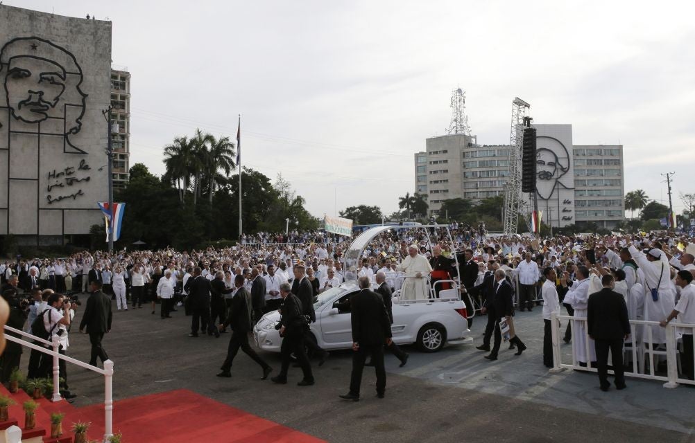 The Pope arrived at the Mass in an open-sided Popemobile