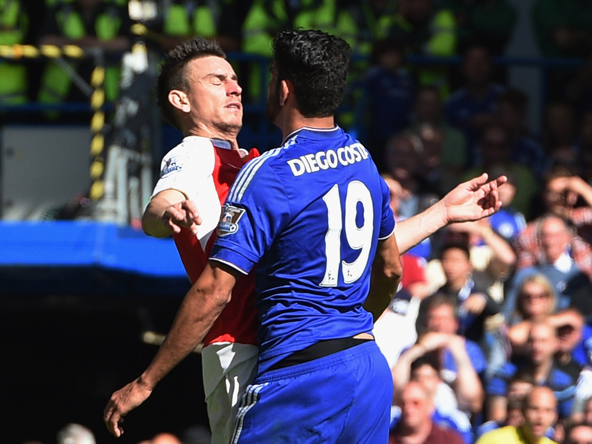Diego Costa and Laurent Koscielny clash during Chelsea's victory over Arsenal