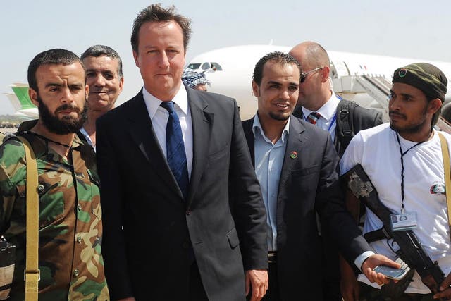 David Cameron's was held 'ultimately responsible' for the collapse of Libya in a Parliamentary report